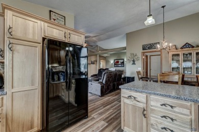 This beautiful four bedroom 3 bath home features LVP throughout on Fountain Springs Golf Club in South Dakota - for sale on GolfHomes.com, golf home, golf lot
