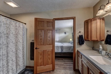 This beautiful four bedroom 3 bath home features LVP throughout on Fountain Springs Golf Club in South Dakota - for sale on GolfHomes.com, golf home, golf lot