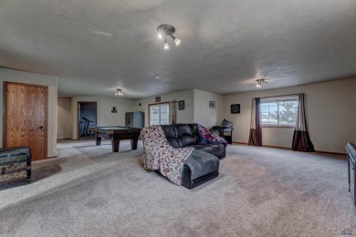 This beautiful four bedroom 3 bath home features LVP throughout on Fountain Springs Golf Club in South Dakota - for sale on GolfHomes.com, golf home, golf lot