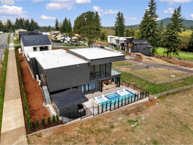 This 5,459 sqft custom northwest modern home is designed for on  in Washington - for sale on GolfHomes.com, golf home, golf lot