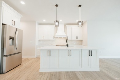 Stunning new construction in desirable Cambridge Village! This on Cambridge Golf Club in Indiana - for sale on GolfHomes.com, golf home, golf lot