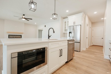 Stunning new construction in desirable Cambridge Village! This on Cambridge Golf Club in Indiana - for sale on GolfHomes.com, golf home, golf lot