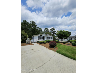 Welcome to 111 Ryder Cup Blvd! This charming 3-bedroom, 2-bath on Bluff Golf Links in North Carolina - for sale on GolfHomes.com, golf home, golf lot