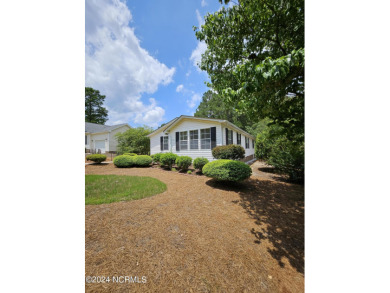 Welcome to 111 Ryder Cup Blvd! This charming 3-bedroom, 2-bath on Bluff Golf Links in North Carolina - for sale on GolfHomes.com, golf home, golf lot