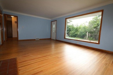 Beautifully laid out rambler is conveniently located within the on Roseville-Cedarholm Golf Club in Minnesota - for sale on GolfHomes.com, golf home, golf lot