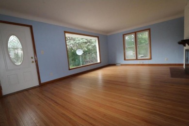 Beautifully laid out rambler is conveniently located within the on Roseville-Cedarholm Golf Club in Minnesota - for sale on GolfHomes.com, golf home, golf lot