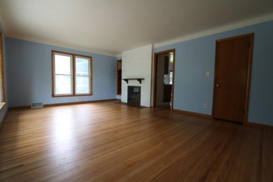 Beautifully laid out rambler is conveniently located within the on Roseville-Cedarholm Golf Club in Minnesota - for sale on GolfHomes.com, golf home, golf lot