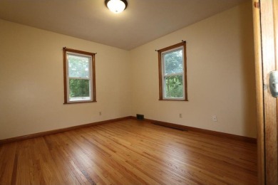 Beautifully laid out rambler is conveniently located within the on Roseville-Cedarholm Golf Club in Minnesota - for sale on GolfHomes.com, golf home, golf lot