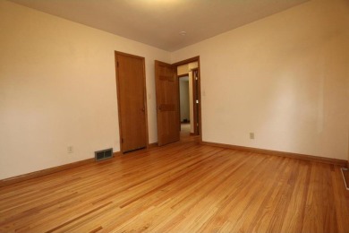 Beautifully laid out rambler is conveniently located within the on Roseville-Cedarholm Golf Club in Minnesota - for sale on GolfHomes.com, golf home, golf lot