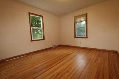 Beautifully laid out rambler is conveniently located within the on Roseville-Cedarholm Golf Club in Minnesota - for sale on GolfHomes.com, golf home, golf lot