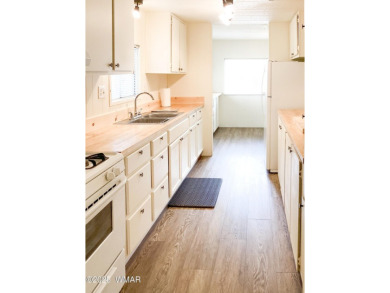 Come take a look at this manufactured home   located in a well on Bison Golf and Country Club in Arizona - for sale on GolfHomes.com, golf home, golf lot