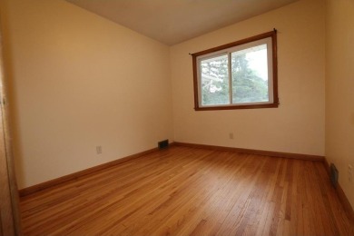 Beautifully laid out rambler is conveniently located within the on Roseville-Cedarholm Golf Club in Minnesota - for sale on GolfHomes.com, golf home, golf lot