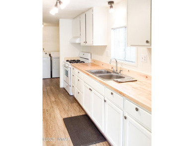 Come take a look at this manufactured home   located in a well on Bison Golf and Country Club in Arizona - for sale on GolfHomes.com, golf home, golf lot