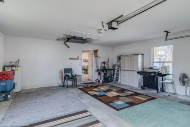 Beautiful furnished Condo Three bedroom, 2 baths, 2 car garage on Spring Lake Golf Resort in Florida - for sale on GolfHomes.com, golf home, golf lot