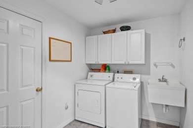 Beautiful furnished Condo Three bedroom, 2 baths, 2 car garage on Spring Lake Golf Resort in Florida - for sale on GolfHomes.com, golf home, golf lot