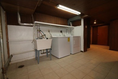 Beautifully laid out rambler is conveniently located within the on Roseville-Cedarholm Golf Club in Minnesota - for sale on GolfHomes.com, golf home, golf lot