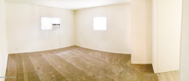 Come take a look at this manufactured home   located in a well on Bison Golf and Country Club in Arizona - for sale on GolfHomes.com, golf home, golf lot