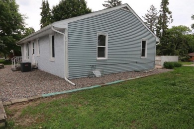 Beautifully laid out rambler is conveniently located within the on Roseville-Cedarholm Golf Club in Minnesota - for sale on GolfHomes.com, golf home, golf lot