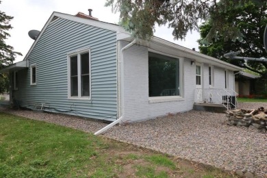 Beautifully laid out rambler is conveniently located within the on Roseville-Cedarholm Golf Club in Minnesota - for sale on GolfHomes.com, golf home, golf lot