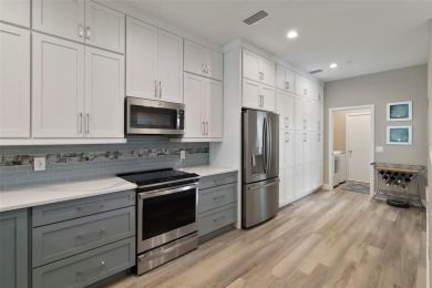Exquisite Completely Remodeled Villa in Pelican Pointe Golf on Pelican Pointe Golf and Country Club in Florida - for sale on GolfHomes.com, golf home, golf lot