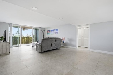 This spacious 3-bedroom, 2.5-bath corner unit in the gated *18th on Inverrary Country Club in Florida - for sale on GolfHomes.com, golf home, golf lot