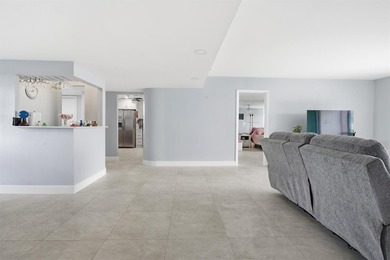 This spacious 3-bedroom, 2.5-bath corner unit in the gated *18th on Inverrary Country Club in Florida - for sale on GolfHomes.com, golf home, golf lot