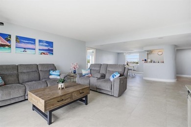 This spacious 3-bedroom, 2.5-bath corner unit in the gated *18th on Inverrary Country Club in Florida - for sale on GolfHomes.com, golf home, golf lot