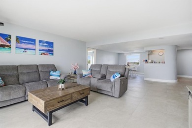 This spacious 3-bedroom, 2.5-bath corner unit in the gated *18th on Inverrary Country Club in Florida - for sale on GolfHomes.com, golf home, golf lot