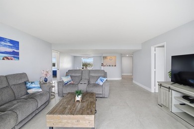 This spacious 3-bedroom, 2.5-bath corner unit in the gated *18th on Inverrary Country Club in Florida - for sale on GolfHomes.com, golf home, golf lot