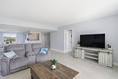 This spacious 3-bedroom, 2.5-bath corner unit in the gated *18th on Inverrary Country Club in Florida - for sale on GolfHomes.com, golf home, golf lot