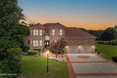 This custom 4-bedroom, 2.5-bath brick home is a true gem on Brunswick Plantation and Golf Resorts in North Carolina - for sale on GolfHomes.com, golf home, golf lot