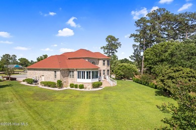 This custom 4-bedroom, 2.5-bath brick home is a true gem on Brunswick Plantation and Golf Resorts in North Carolina - for sale on GolfHomes.com, golf home, golf lot