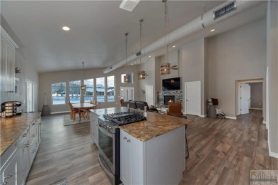 Immerse yourself in luxury living in this stunning 3-bedroom on Red Lodge Golf Club in Montana - for sale on GolfHomes.com, golf home, golf lot