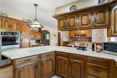 Discover timeless charm in this meticulously maintained custom on Ohio Prestwick Country Club in Ohio - for sale on GolfHomes.com, golf home, golf lot