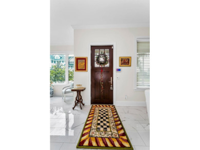 This stunning 3-bedroom, 3-bath townhome offers luxury living in on Belleair Country Club in Florida - for sale on GolfHomes.com, golf home, golf lot