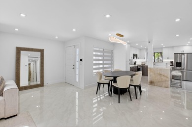 First Floor beautiful, totally renovated condo offering stunning on Gleneagles Golf and Country Club in Florida - for sale on GolfHomes.com, golf home, golf lot