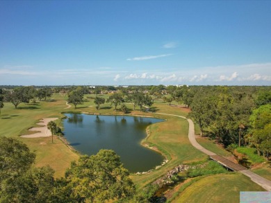 Enjoy stunning views of the golf course and creek from your on IMG Academies Golf and Country Club in Florida - for sale on GolfHomes.com, golf home, golf lot