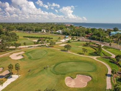 Enjoy stunning views of the golf course and creek from your on IMG Academies Golf and Country Club in Florida - for sale on GolfHomes.com, golf home, golf lot