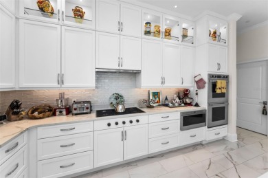 This stunning 3-bedroom, 3-bath townhome offers luxury living in on Belleair Country Club in Florida - for sale on GolfHomes.com, golf home, golf lot