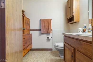 Discover timeless charm in this meticulously maintained custom on Ohio Prestwick Country Club in Ohio - for sale on GolfHomes.com, golf home, golf lot