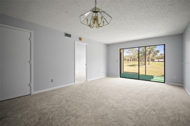 Welcome to this beautifully maintained 2-bedroom, 2-bath ground on The Meadows Golf and Country Club in Florida - for sale on GolfHomes.com, golf home, golf lot