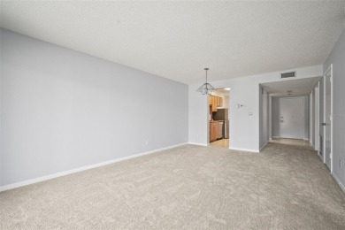Welcome to this beautifully maintained 2-bedroom, 2-bath ground on The Meadows Golf and Country Club in Florida - for sale on GolfHomes.com, golf home, golf lot