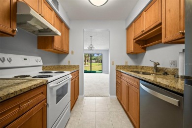Welcome to this beautifully maintained 2-bedroom, 2-bath ground on The Meadows Golf and Country Club in Florida - for sale on GolfHomes.com, golf home, golf lot
