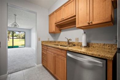 Welcome to this beautifully maintained 2-bedroom, 2-bath ground on The Meadows Golf and Country Club in Florida - for sale on GolfHomes.com, golf home, golf lot