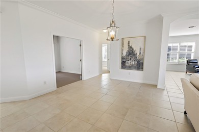 Welcome home to this beautiful golf course retreat. Perfectly on Grand Harbor Golf and Country Club in Florida - for sale on GolfHomes.com, golf home, golf lot