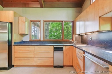 Calling all Mid-Century Modern lovers! This is a diamond in the on Carolina Trace Country Club in North Carolina - for sale on GolfHomes.com, golf home, golf lot