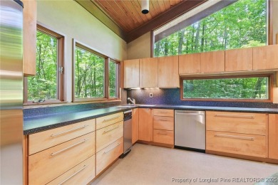 Calling all Mid-Century Modern lovers! This is a diamond in the on Carolina Trace Country Club in North Carolina - for sale on GolfHomes.com, golf home, golf lot