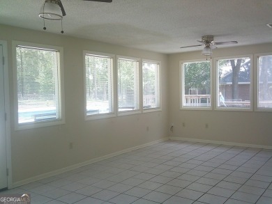 Welcome to Lake Park GA - home to this GREAT 3 bedroom 2 bath on Francis Lake Golf Club in Georgia - for sale on GolfHomes.com, golf home, golf lot