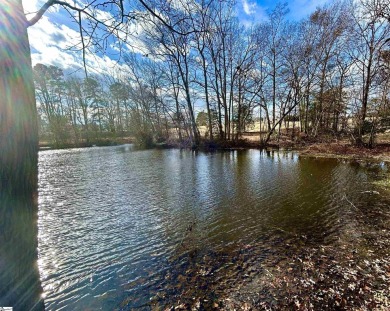 Beautifully renovated, waterfront and maintenance free living on Holly Tree Country Club in South Carolina - for sale on GolfHomes.com, golf home, golf lot