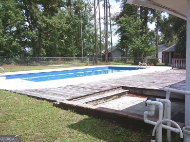 Welcome to Lake Park GA - home to this GREAT 3 bedroom 2 bath on Francis Lake Golf Club in Georgia - for sale on GolfHomes.com, golf home, golf lot
